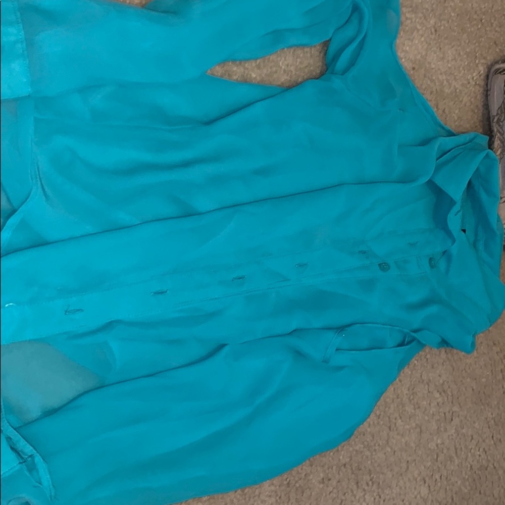 Open shoulder teal long sleeve shirt